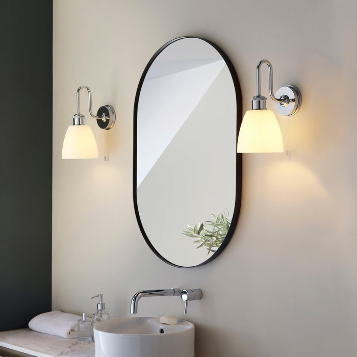 piper chrome bathroom wall light with opal glass shade by Endon Lighting Living Room Family Shot