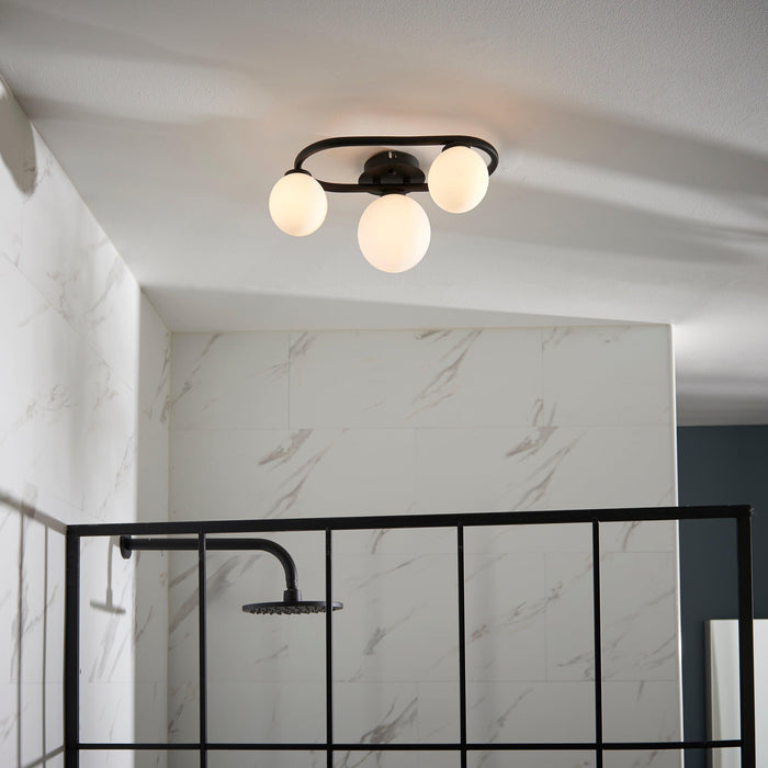 pulsa 3 light black glass semi flush ceiling light by Endon Lighting Living room close up image