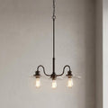 Three-light bronze ceiling pendant featuring curved arms, flat clear glass shades, and Edison-style bulbs.