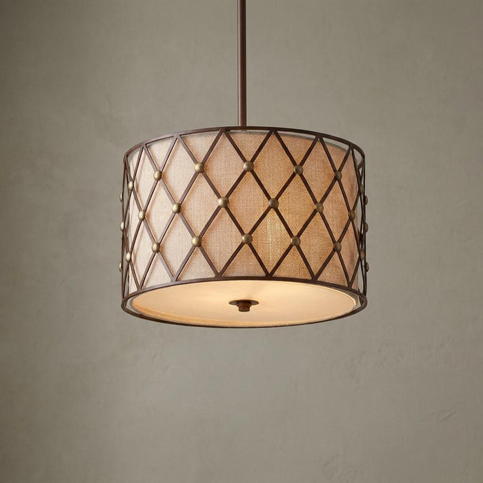 Brown lattice pendant light with a textured fabric drum shade and bronze metal detailing.