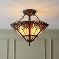 Quoizel Cambridge semi-flush Tiffany ceiling light with a warm stained glass shade and bronze metal hardware.