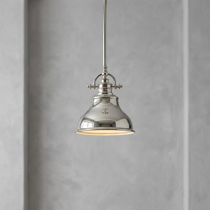 Polished silver mini pendant ceiling light with an industrial-style bell shade against a grey textured wall.