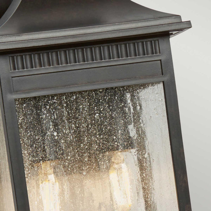 Quoizel Livingston Medium Outdoor Wall Light by exterior wall image close up