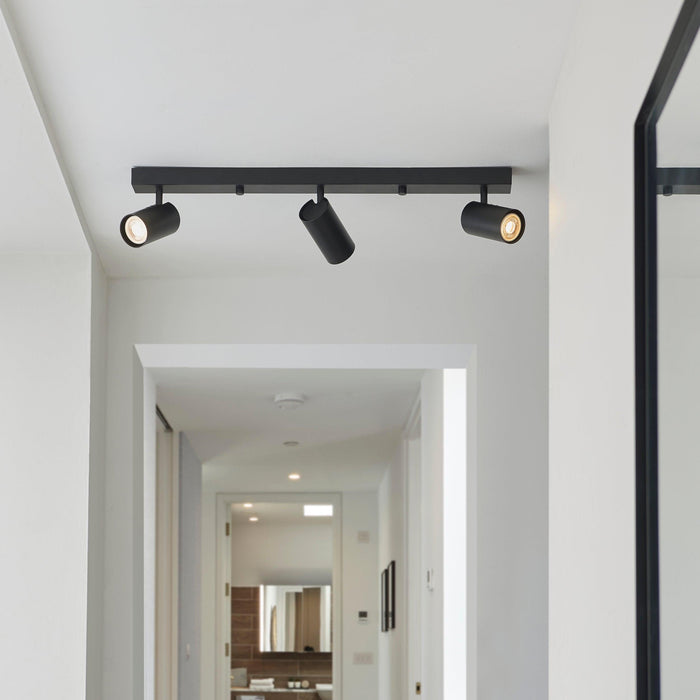 rez 3 light black modern adjustable plate spot light by Endon Lighting Living Room Family Shot