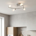 Sare 4-light chrome flush ceiling fixture with opal petal shades in a modern neutral kitchen.
