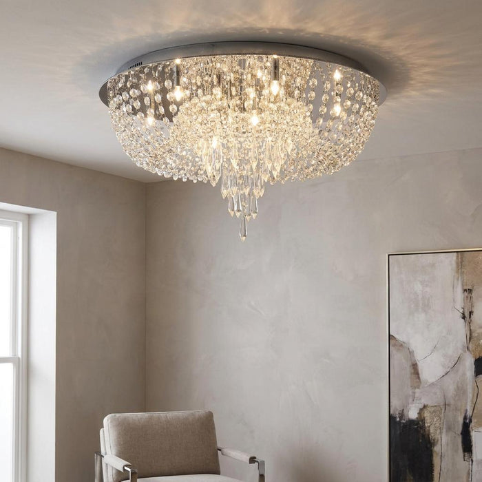 Chrome 10-light crystal ceiling flush fixture illuminating a modern living room.