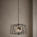 Black geometric 3-light ceiling pendant with nested rectangular frames hanging from a chain against a neutral wall.