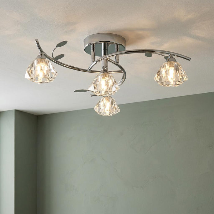Sierra 4-light chrome semi-flush ceiling fixture with faceted glass shades and decorative metal leaf accents.