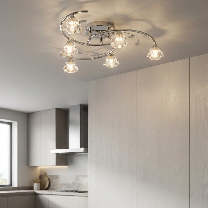 Sierra 6-light chrome and glass semi-flush ceiling light with swirling arms in a modern kitchen setting.