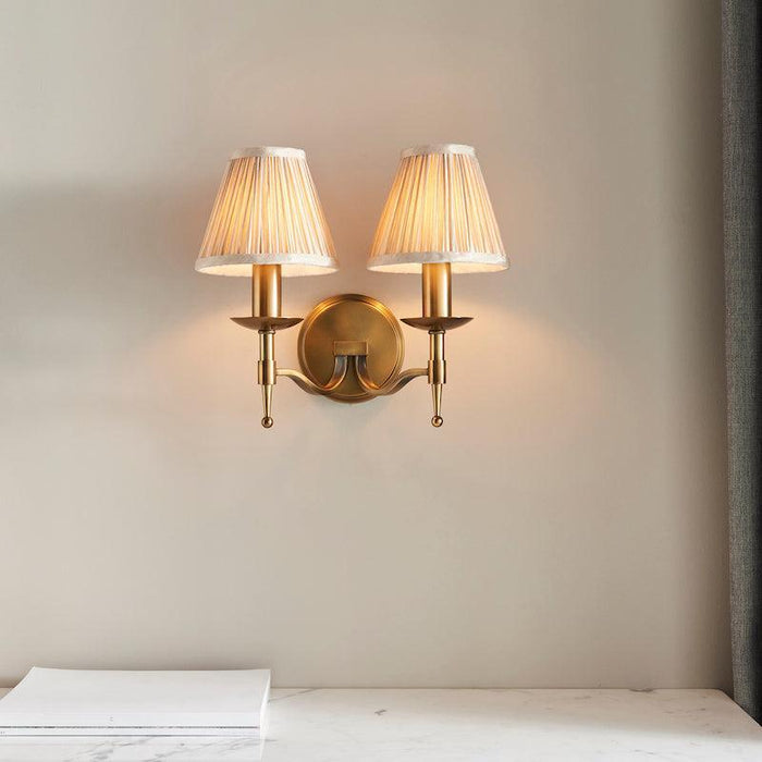 Stanford Antique Brass Double Wall Light - Beige Shades Wide Living Room Image