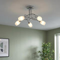 Tara 5 Light Chrome Semi-flush Ceiling Light with frosted glass shades in a green room.