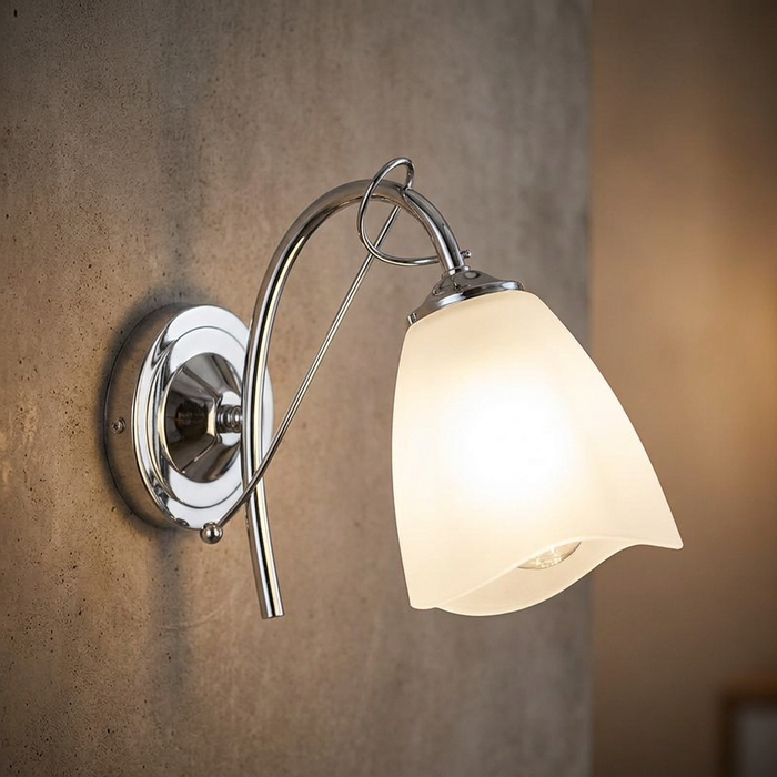 Oaks Turin 1 Light chrome wall light with a frosted tulip glass shade mounted on a textured wall.